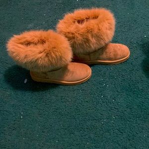 Furry boots, they’ve never been worn